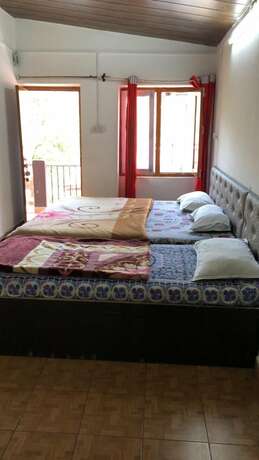 Imagen general del Hotel Goroomgo Colonel Cottage Lake View. Foto 1