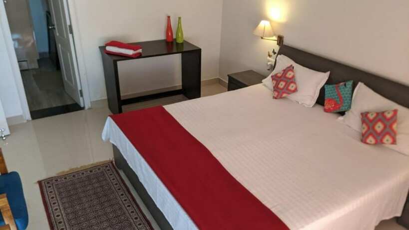 Imagen de la habitación del Hotel Goroomgo Colonel Cottage Lake View. Foto 16
