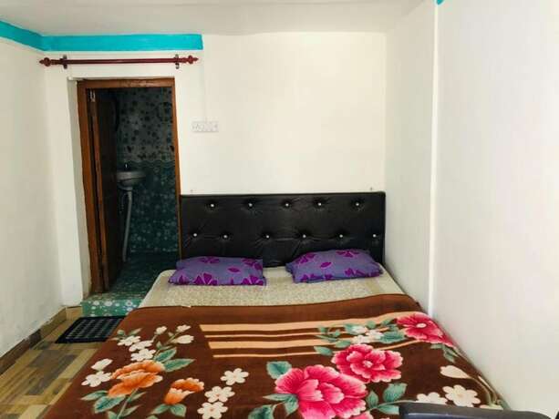 Imagen de la habitación del Hotel Goroomgo Colonel Cottage Lake View. Foto 18
