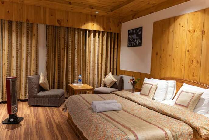 Imagen general del Hotel Goroomgo Conifer Manali. Foto 1