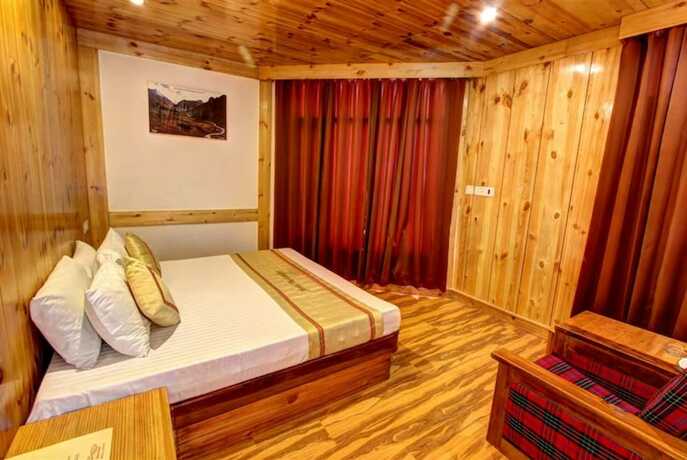 Imagen general del Hotel Goroomgo Conifer Manali. Foto 3