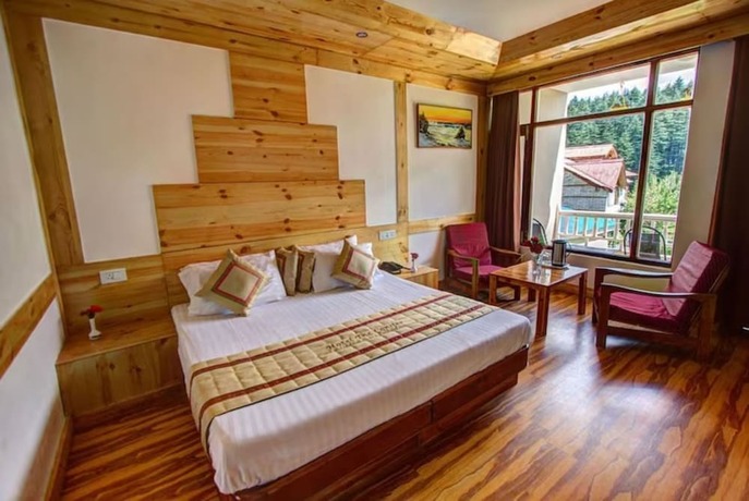 Imagen general del Hotel Goroomgo Conifer Manali. Foto 5