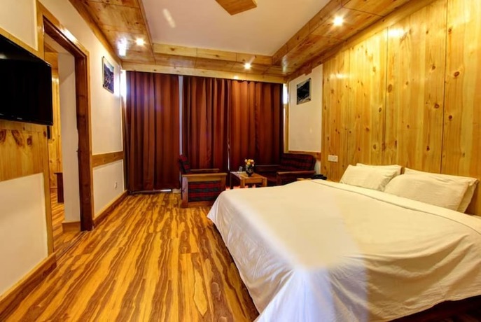 Imagen general del Hotel Goroomgo Conifer Manali. Foto 8