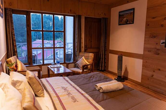 Imagen general del Hotel Goroomgo Conifer Manali. Foto 9