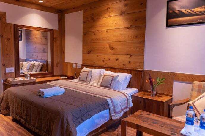 Imagen de la habitación del Hotel Goroomgo Conifer Manali. Foto 18