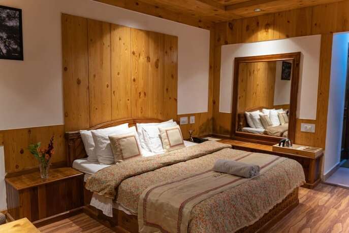 Imagen de la habitación del Hotel Goroomgo Conifer Manali. Foto 19