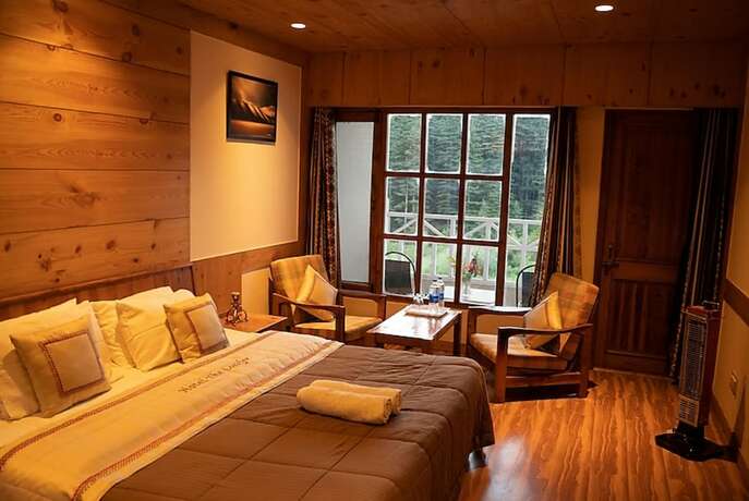 Imagen de la habitación del Hotel Goroomgo Conifer Manali. Foto 20