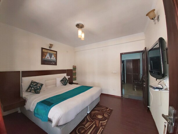 Imagen de la habitación del Hotel Goroomgo Cottage Lorent Nainital. Foto 11