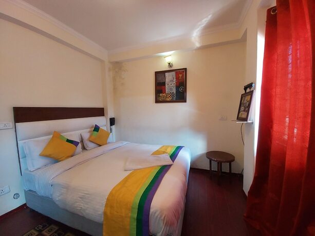 Imagen de la habitación del Hotel Goroomgo Cottage Lorent Nainital. Foto 12