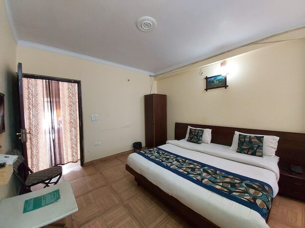 Imagen de la habitación del Hotel Goroomgo Cottage Lorent Nainital. Foto 15
