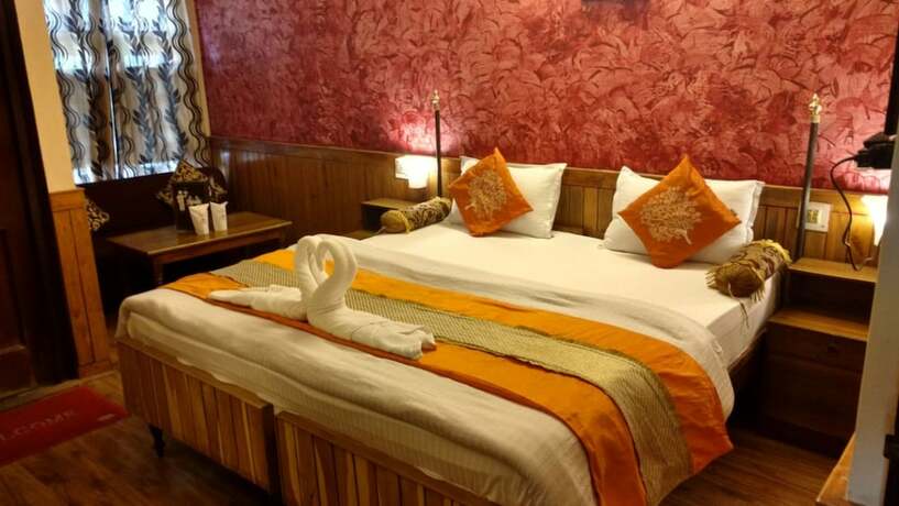 Imagen de la habitación del Hotel Goroomgo Deluxe Ankur Lake View Nainital. Foto 16