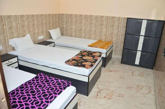 Imagen de la habitación del Hotel Goroomgo Dev Guest House Howrah Kolkata. Foto 16