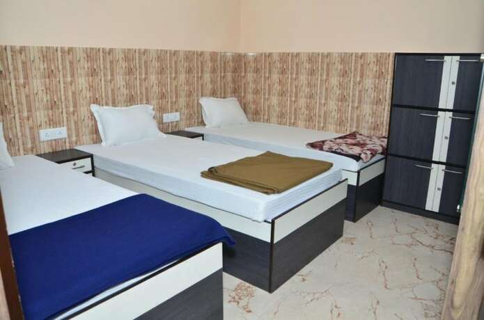 Imagen de la habitación del Hotel Goroomgo Dev Guest House Howrah Kolkata. Foto 19
