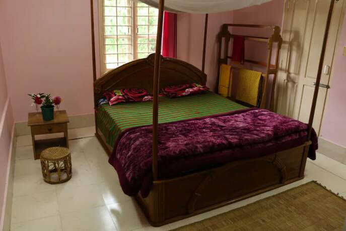 Imagen de la habitación del Hotel Goroomgo Eco Haritage Villa Imphal. Foto 7