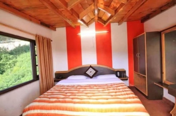 Imagen de la habitación del Hotel Goroomgo. Foto 10