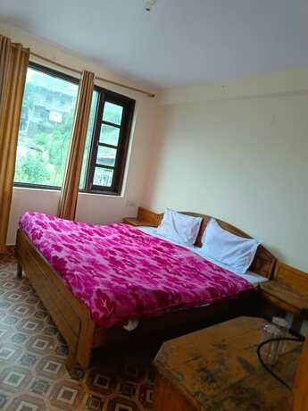 Imagen de la habitación del Hotel Goroomgo. Foto 11