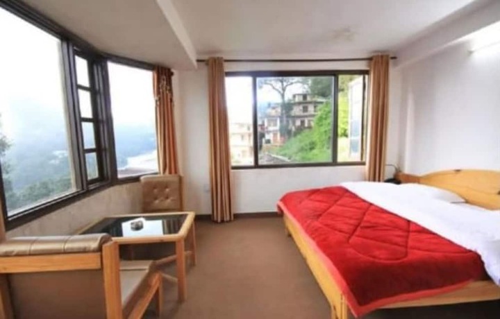 Imagen de la habitación del Hotel Goroomgo. Foto 13