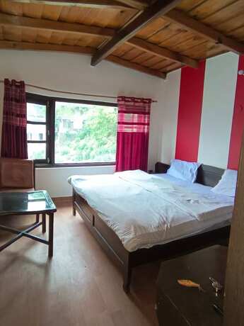 Imagen de la habitación del Hotel Goroomgo. Foto 14