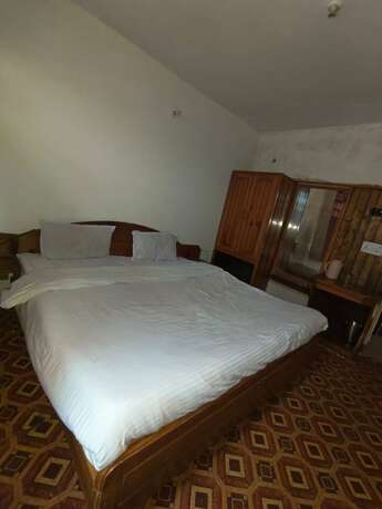 Imagen de la habitación del Hotel Goroomgo. Foto 16