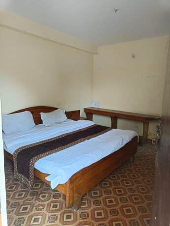 Imagen de la habitación del Hotel Goroomgo. Foto 17