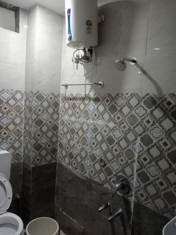 Imagen de la habitación del Hotel Goroomgo Four Season Varanasi. Foto 10