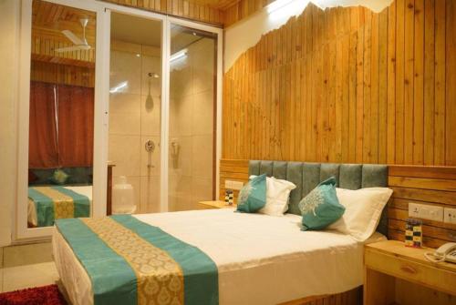 Imagen de la habitación del Hotel Goroomgo Gandhi\'s Paradise Dharamshala. Foto 16