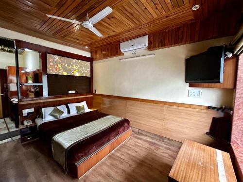 Imagen de la habitación del Hotel Goroomgo Gandhi\'s Paradise Dharamshala. Foto 19