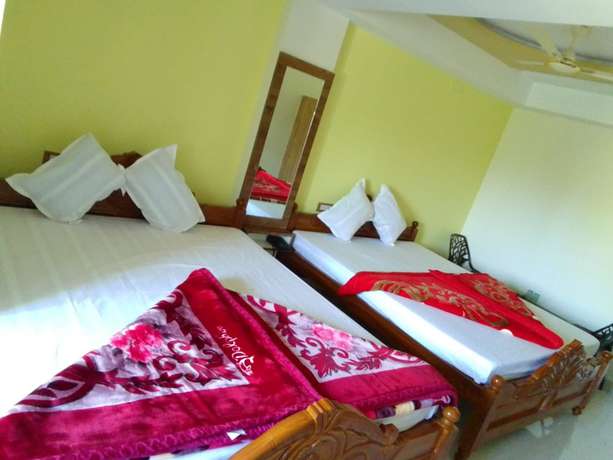 Imagen de la habitación del Hotel Goroomgo Ganga Arati Digha. Foto 5
