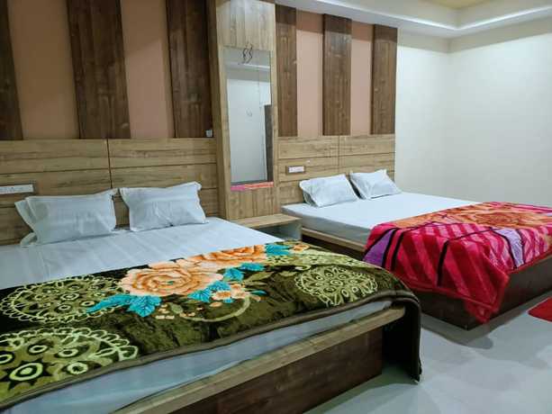 Imagen de la habitación del Hotel Goroomgo Ganga Arati Digha. Foto 6