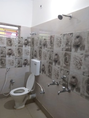 Imagen de la habitación del Hotel Goroomgo Gayatri Guest House Haridwar. Foto 8