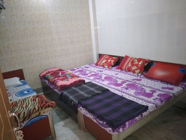 Imagen de la habitación del Hotel Goroomgo Gayatri Guest House Haridwar. Foto 9
