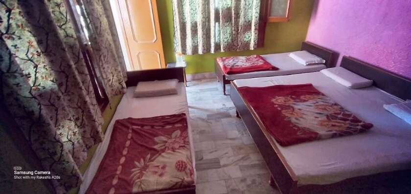Imagen de la habitación del Hotel Goroomgo Gayatri Guest House Haridwar. Foto 10