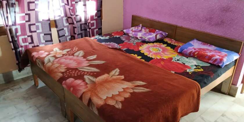Imagen de la habitación del Hotel Goroomgo Gayatri Guest House Haridwar. Foto 11