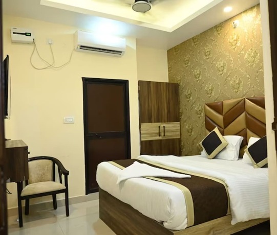 Imagen de la habitación del Hotel Goroomgo Glance Inn Patna. Foto 7