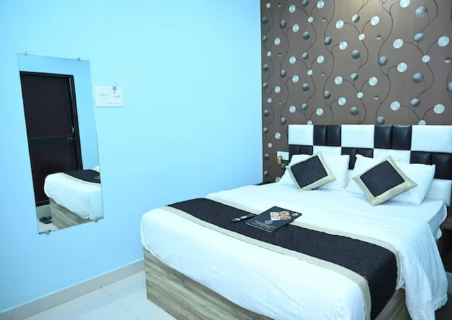 Imagen de la habitación del Hotel Goroomgo Glance Inn Patna. Foto 9