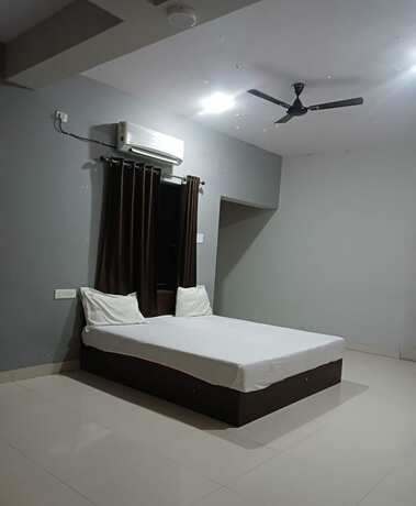 Imagen de la habitación del Hotel Goroomgo Grace Premium Bhubaneswar. Foto 15
