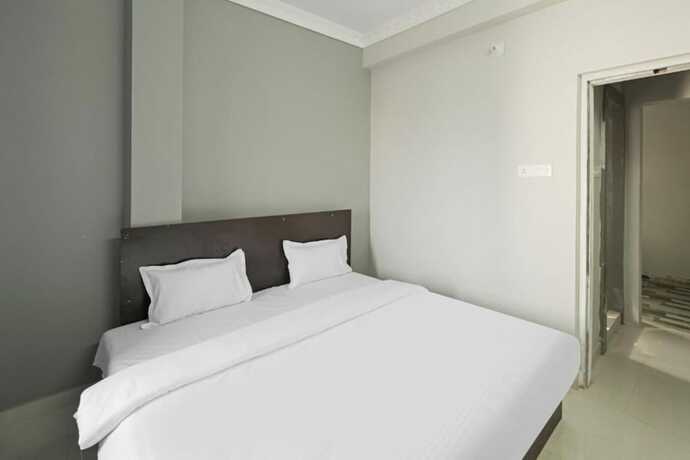 Imagen de la habitación del Hotel Goroomgo Grace Premium Bhubaneswar. Foto 16