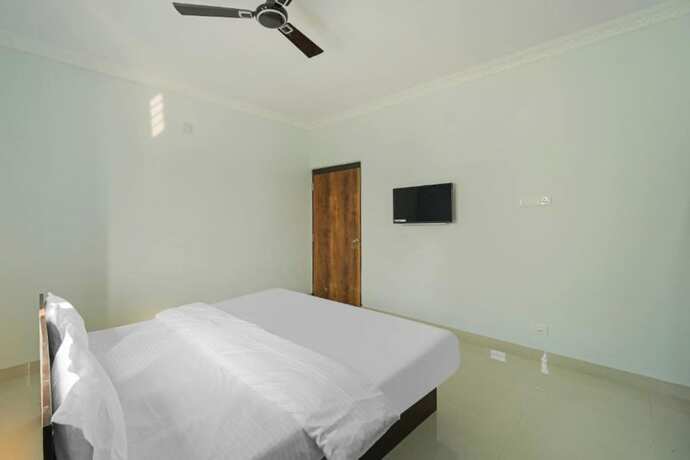 Imagen de la habitación del Hotel Goroomgo Grace Premium Bhubaneswar. Foto 18