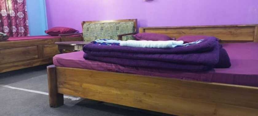 Imagen de la habitación del Hotel Goroomgo Green Gold Resort Lataguri. Foto 7