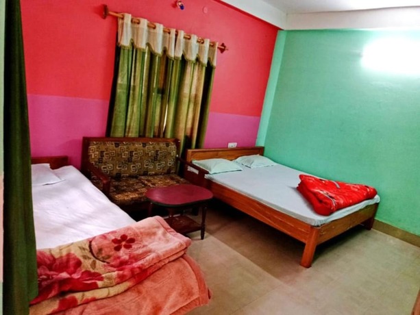 Imagen de la habitación del Hotel Goroomgo Green Gold Resort Lataguri. Foto 8