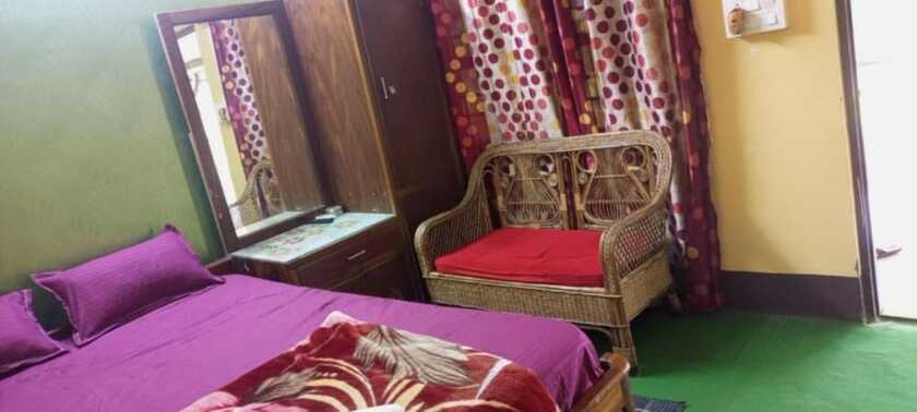 Imagen de la habitación del Hotel Goroomgo Green Gold Resort Lataguri. Foto 9