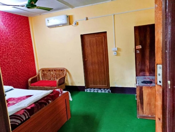 Imagen de la habitación del Hotel Goroomgo Green Gold Resort Lataguri. Foto 10