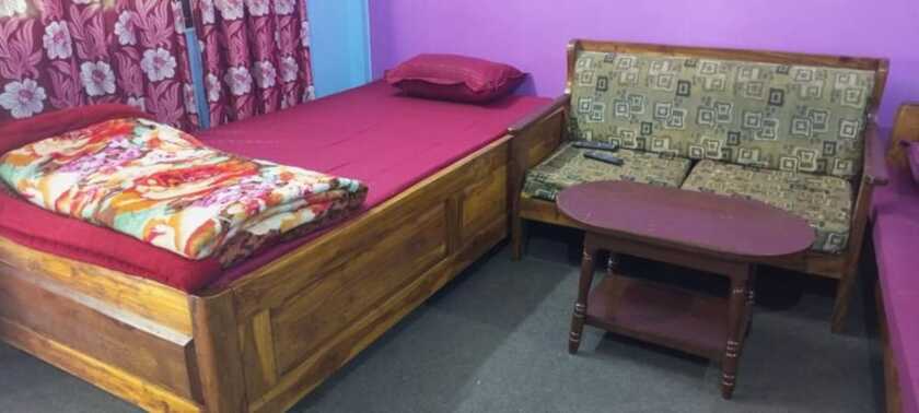 Imagen de la habitación del Hotel Goroomgo Green Gold Resort Lataguri. Foto 11