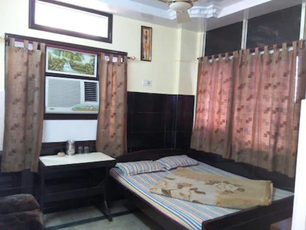 Imagen de la habitación del Hotel Goroomgo Greenland Guwahati. Foto 7