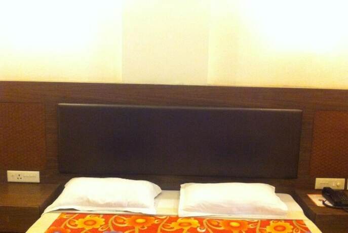 Imagen de la habitación del Hotel Goroomgo Heera Celebration Mathura. Foto 8