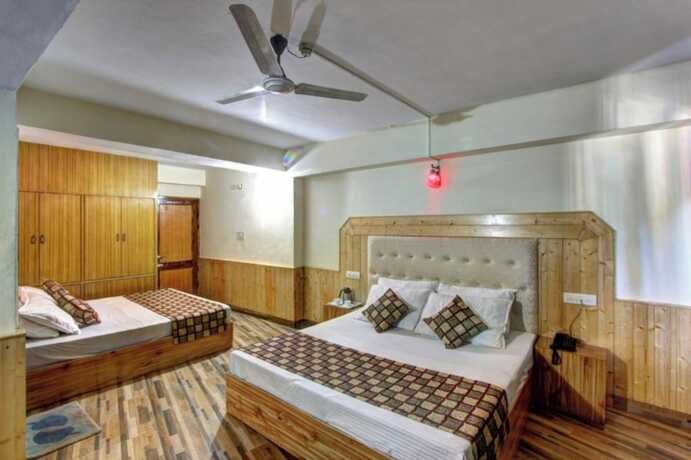 Imagen de la habitación del Hotel Goroomgo Highway Inn Manali. Foto 14