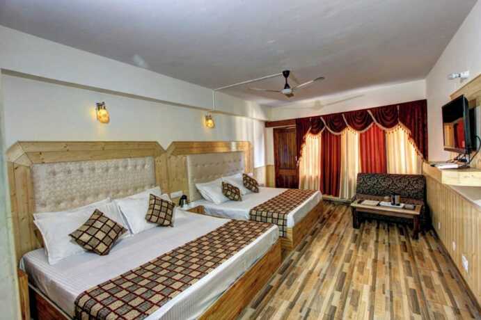 Imagen de la habitación del Hotel Goroomgo Highway Inn Manali. Foto 16