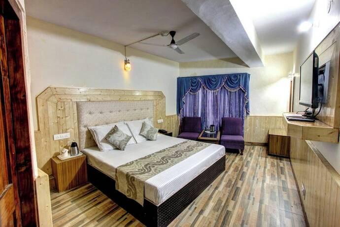 Imagen general del Hotel Goroomgo Highway Inn Manali. Foto 7