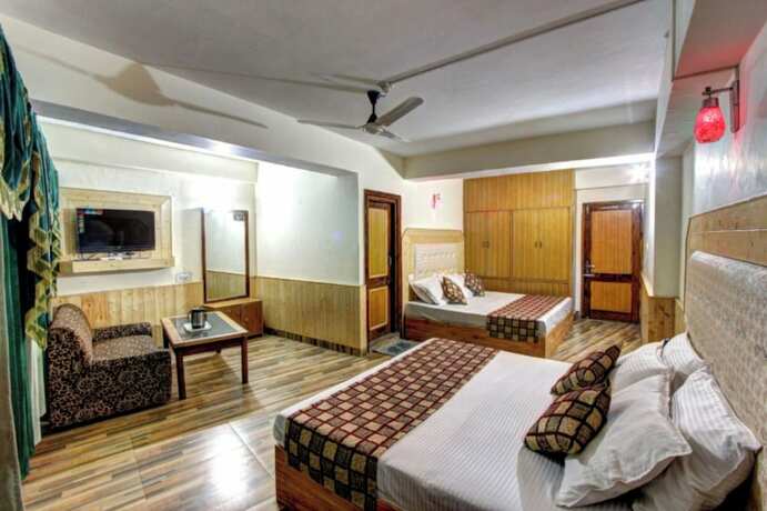 Imagen general del Hotel Goroomgo Highway Inn Manali. Foto 8
