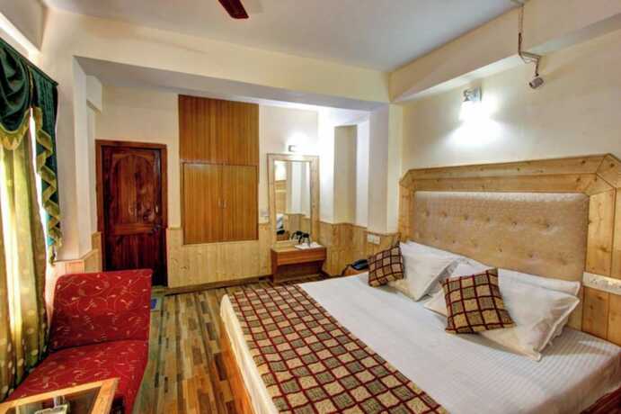Imagen general del Hotel Goroomgo Highway Inn Manali. Foto 12